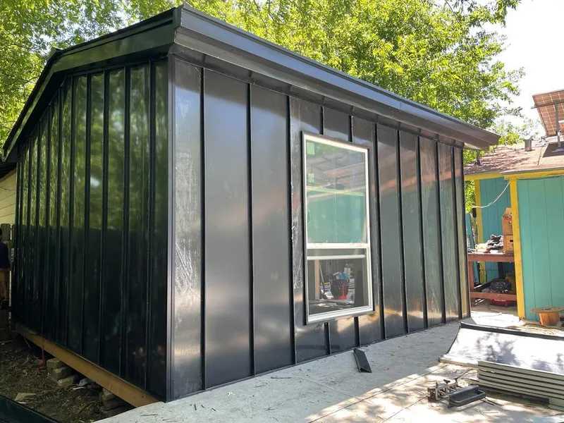 Black standing seam metal wall panels for Roof Inspection in Solvay