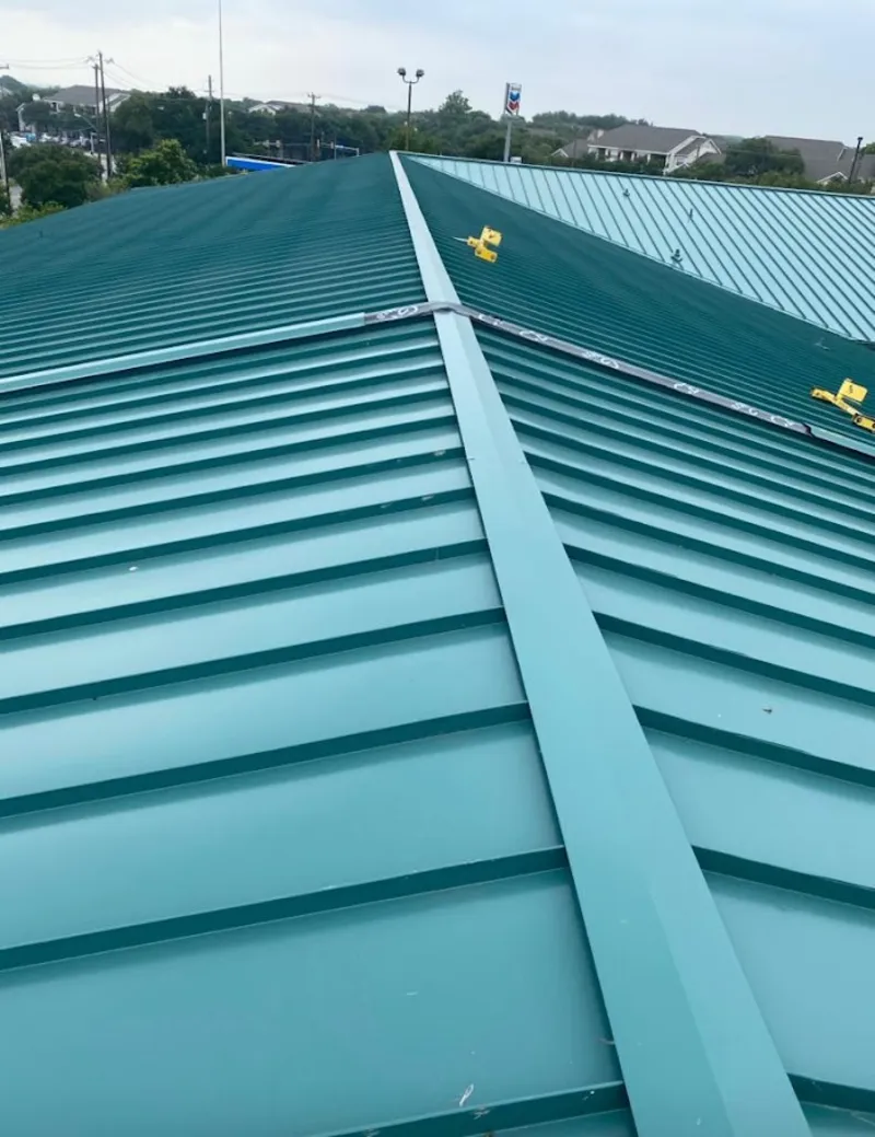 Green commercial metal roof ridge and valley for Metal Roof Repair in Solvay